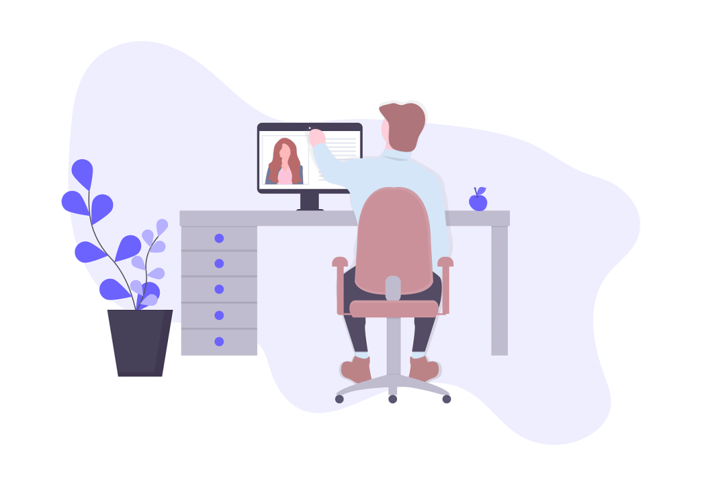 man in a video call with a woman