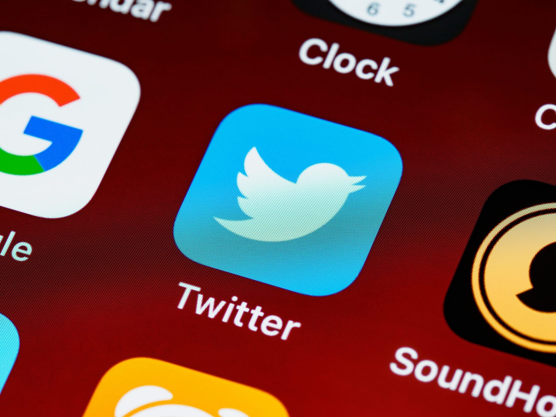 Twitter app shown on a phone Twitter app shown on a phone