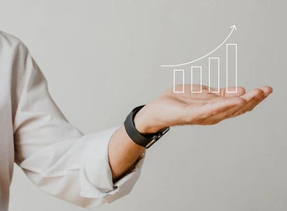 hand showing a graph hand showing a graph